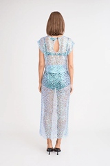 Delphine Top by Pfeiffer, lightweight sequin knit, relaxed fit with keyhole back neck detail. Perfect for layering over bras or swimwear. Spot clean only, 100% polyester.








