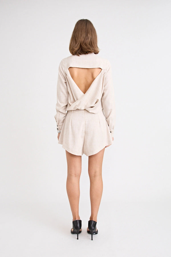 Pino Tailored Short by Pfeiffer — a lightweight mid-rise short with a curved hem and clean tailored finish, ideal for polished daytime looks.
