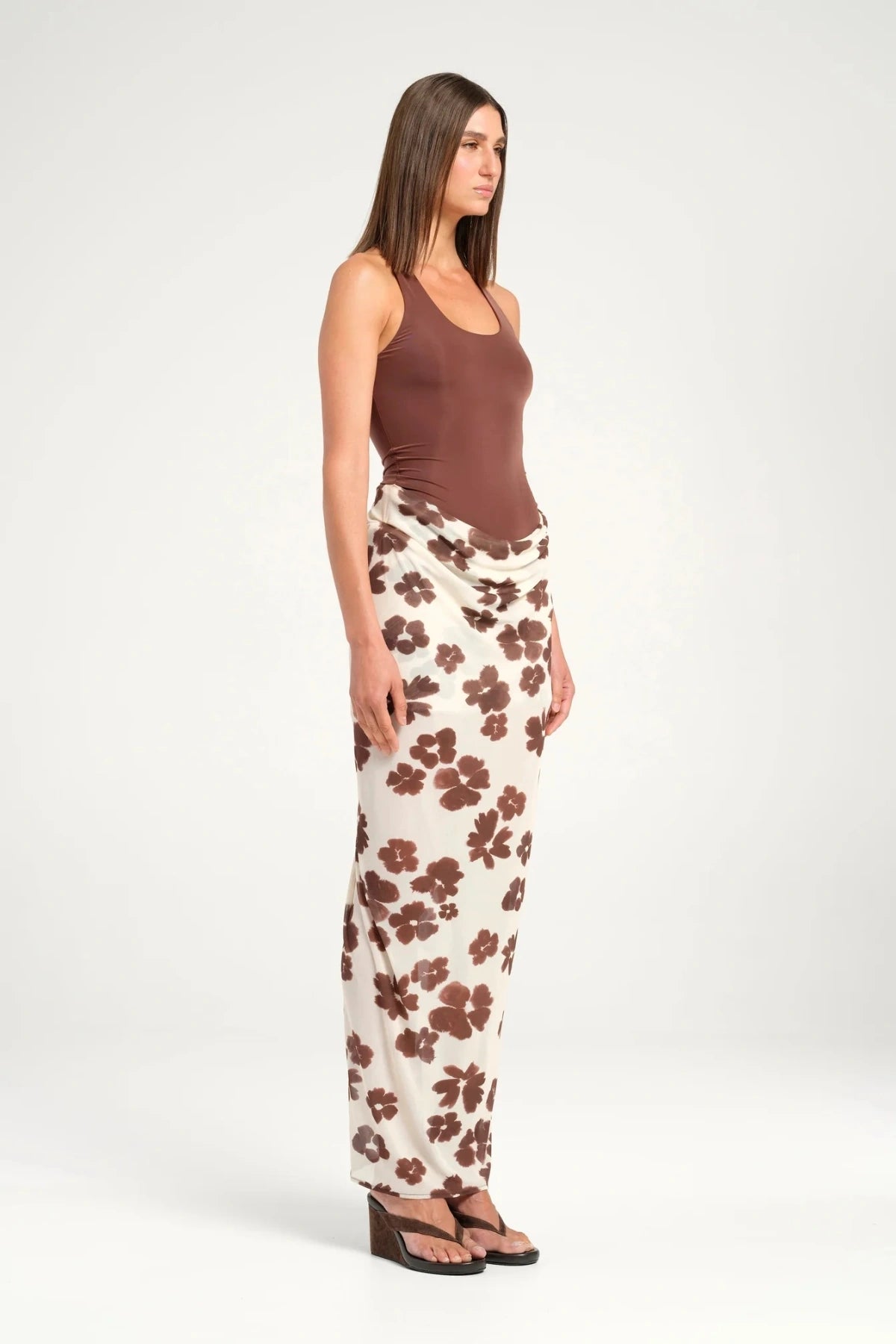 Piper Maxi Dress by Benni, racerback bodysuit with sheer draped cowl skirt in viscose, a striking trendy silhouette perfect for evening wear.