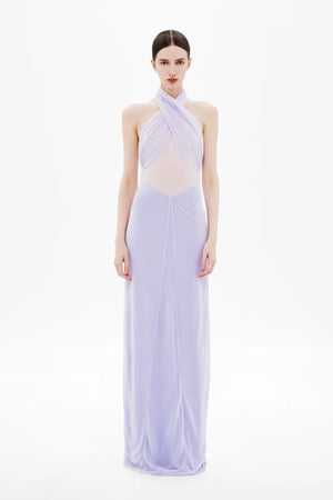 Pippa Braid Dress by Misha, a halter maxi in fluid jersey with crossover bodice, sheer midsection, and sculptural braided back for timeless elegance.