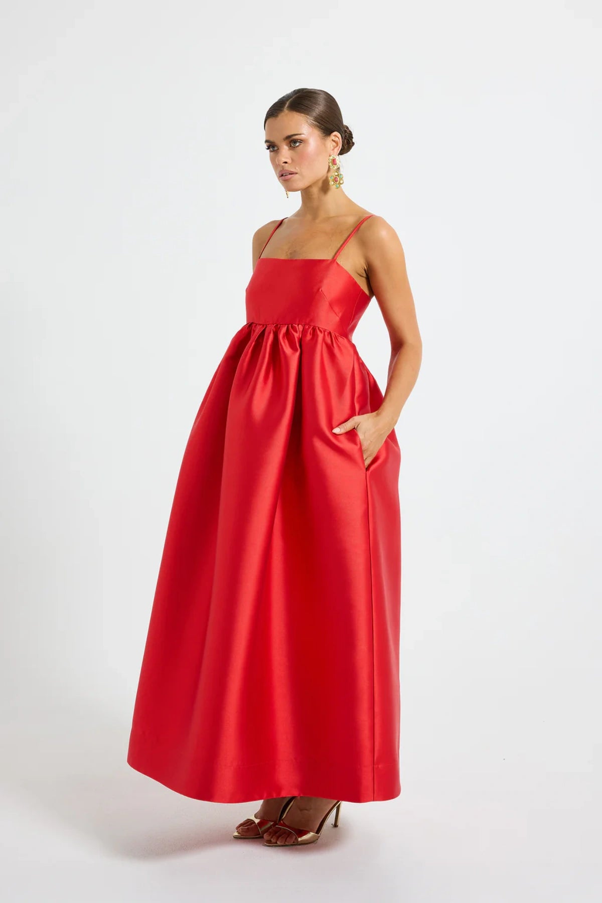 Pippa Flared Midi by Pasduchas — a poppy-red taffeta midi with adjustable straps and a full flowing skirt, perfect for elegant occasion wear.