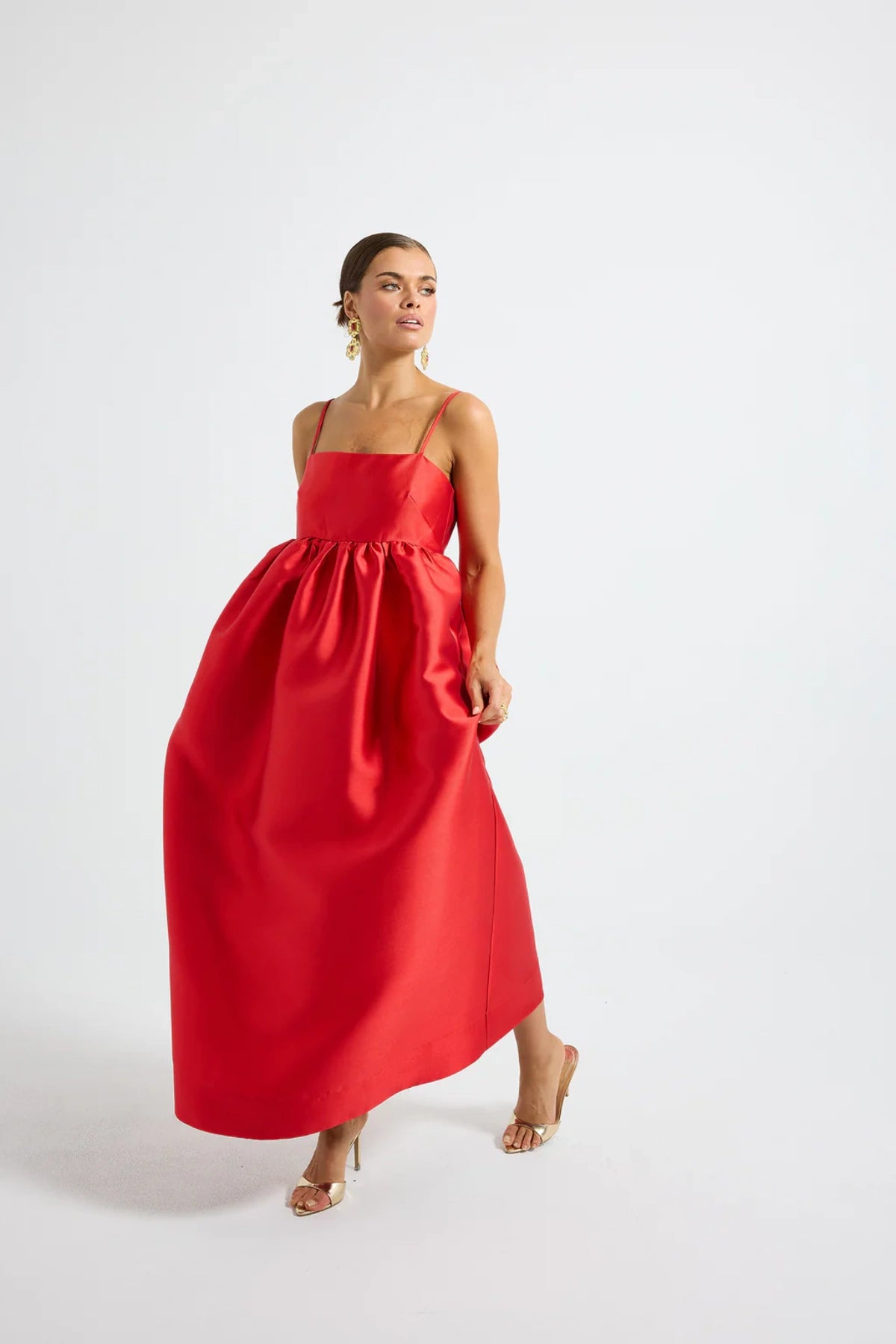 Pippa Flared Midi by Pasduchas — a poppy-red taffeta midi with adjustable straps and a full flowing skirt, perfect for elegant occasion wear.