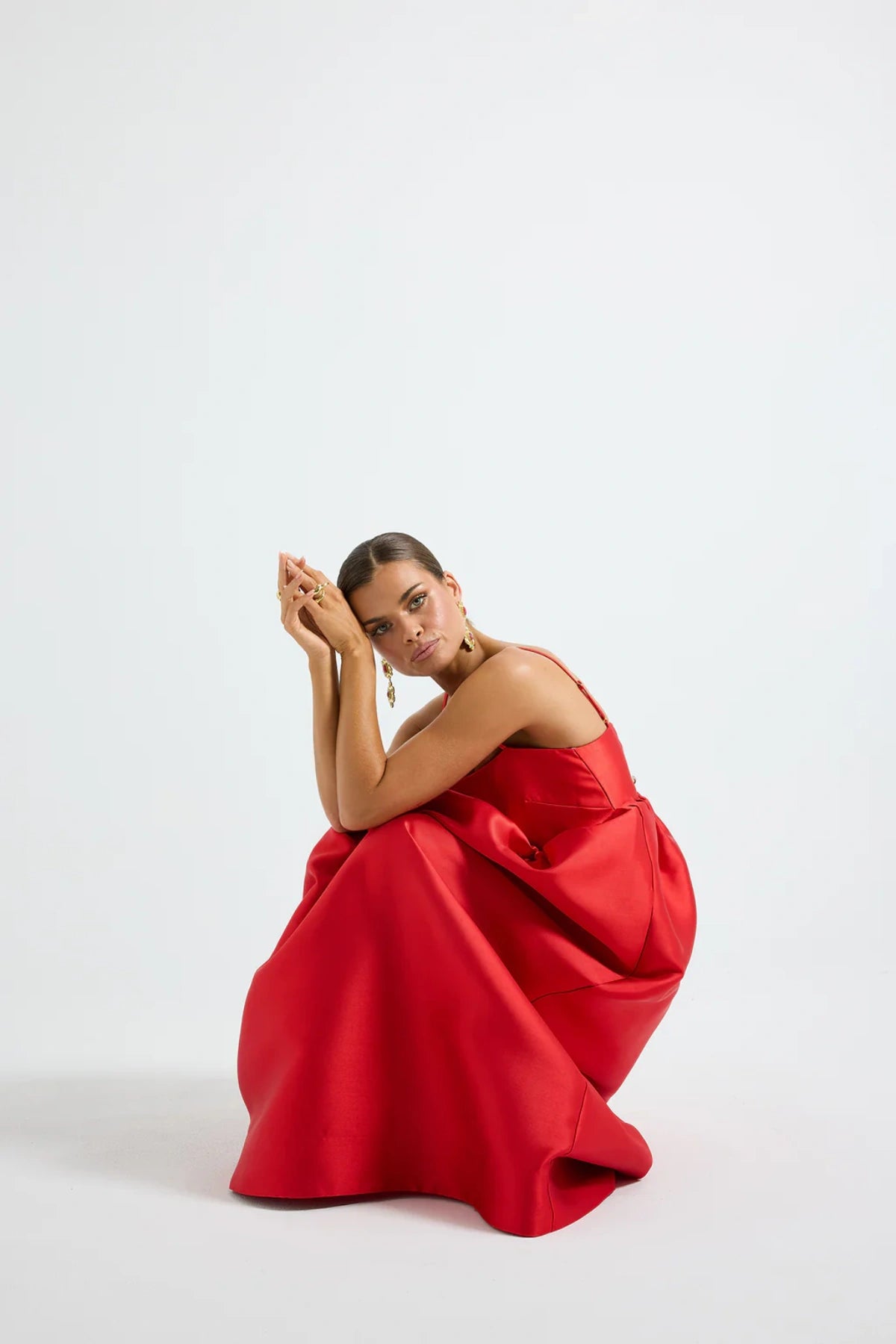 Pippa Flared Midi by Pasduchas — a poppy-red taffeta midi with adjustable straps and a full flowing skirt, perfect for elegant occasion wear.