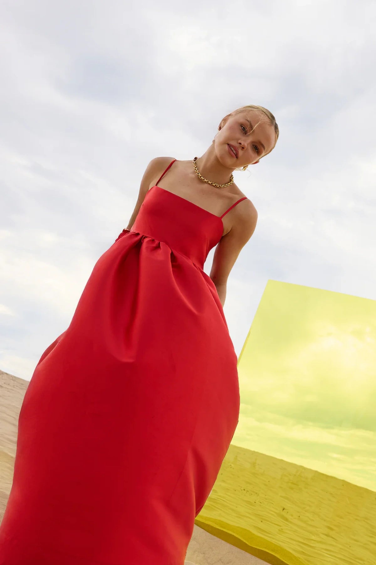 Pippa Flared Midi by Pasduchas — a poppy-red taffeta midi with adjustable straps and a full flowing skirt, perfect for elegant occasion wear.