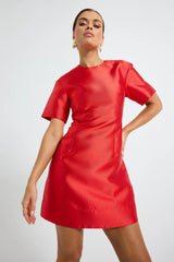 Pippa Sleeve Mini Dress by Pasduchas — a lustrous taffeta mini with short sleeves and a fitted silhouette, perfect for polished occasion styling.