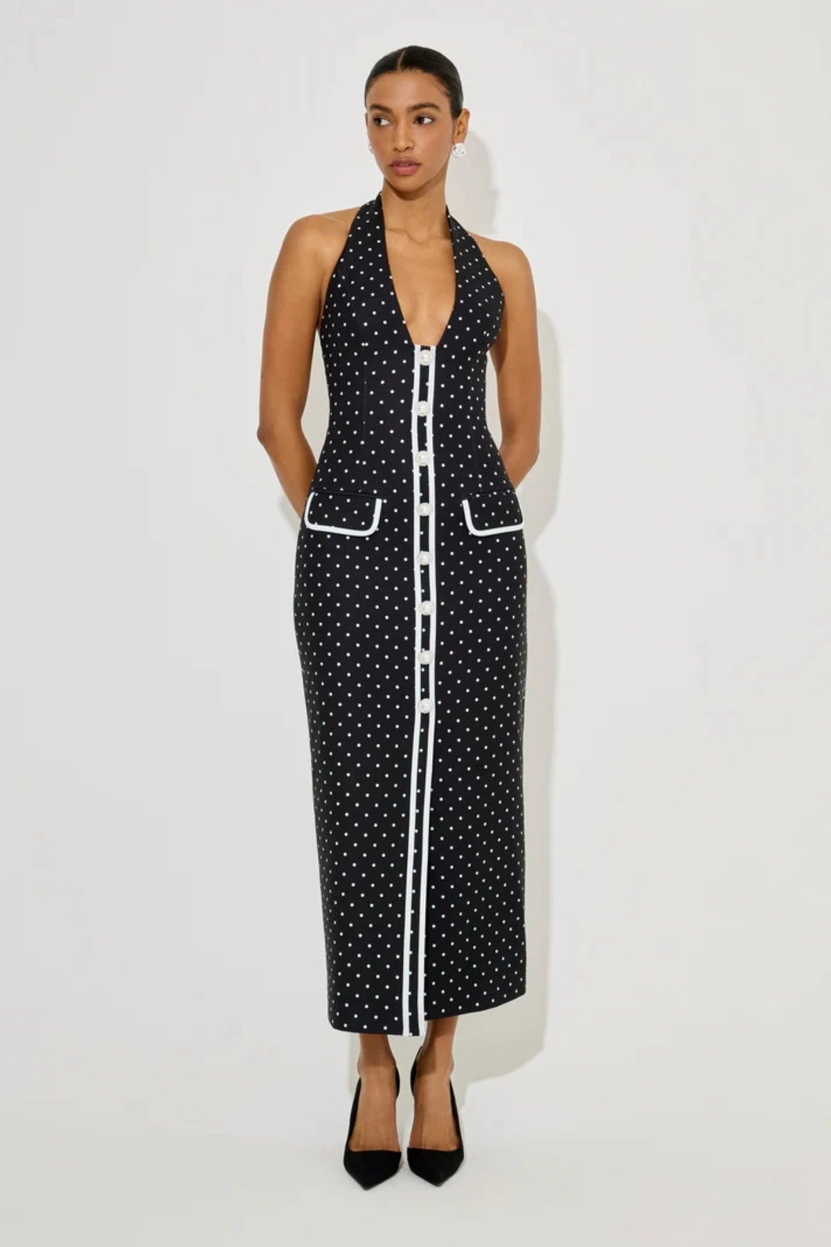 Polka Dot Button Midi Dress by Odd Muse, a fitted classic with a playful print and timeless shape. Perfect for day-to-night styling.
