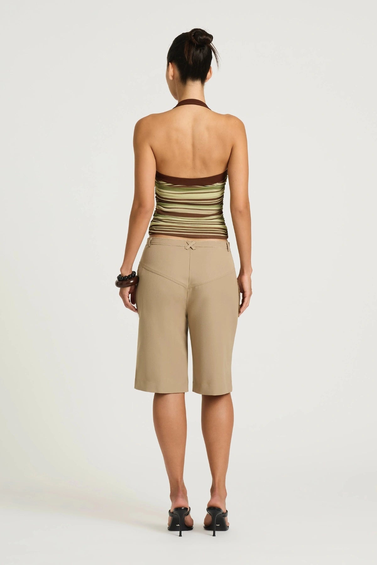 Poppy Halter Top Earth Stripe by Benni, a stretch halter top with ruching and a straight neckline for a sleek, flattering fit.
