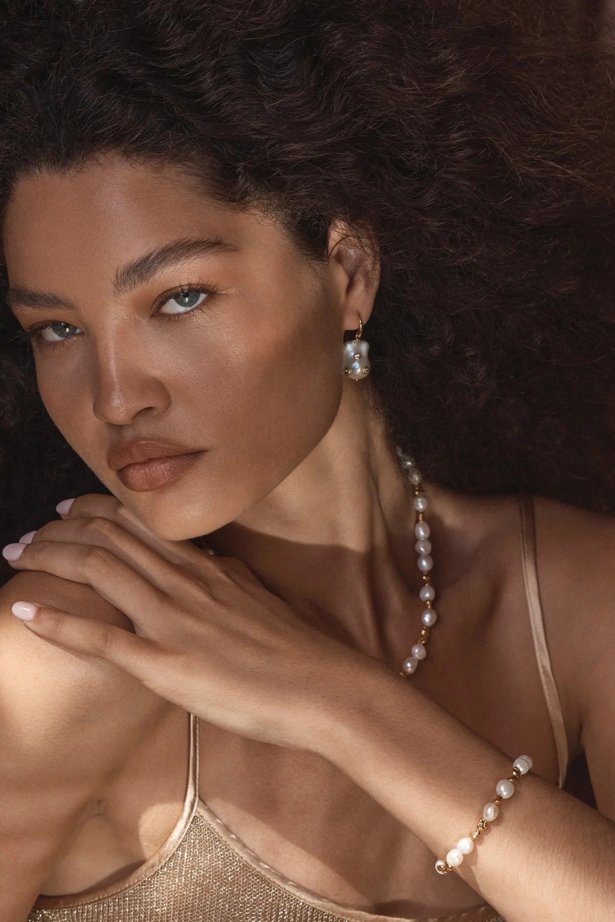 Portofino Bracelet by Amber Sceats, handcrafted with AAA+ freshwater pearls and 24K gold-plated beads for timeless modern elegance.