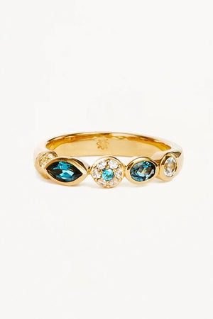 18k Gold Vermeil Protection of Eye Topaz Ring by By Charlotte, featuring natural blue topaz and cubic zirconias, perfect for adding a radiant, protective touch to your stacking rings.