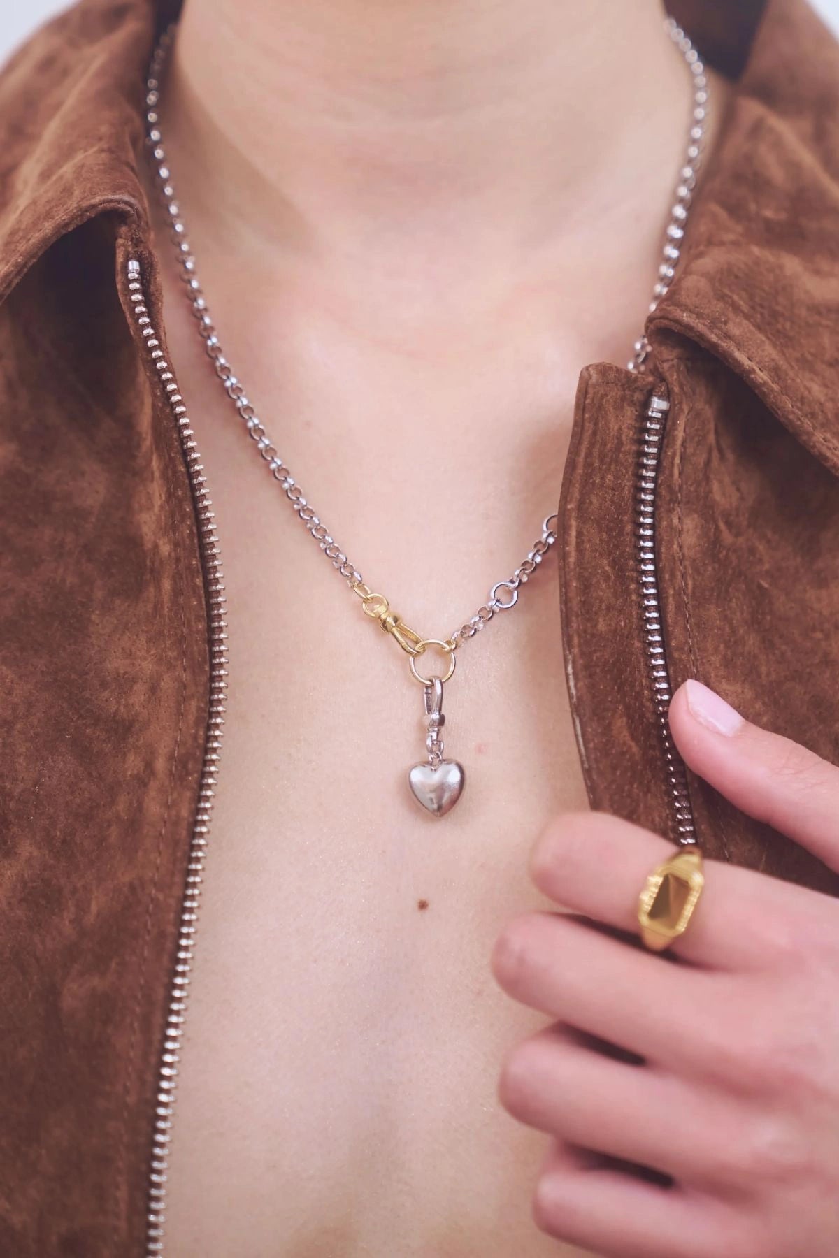 Puff Heart Necklace in Silver by Avant Studio, a silver belcher chain with detachable gold clasp and heart charm. Perfect layered or worn solo.