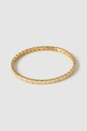 Quinn Gold Cuff Stone by Arms of Eve, a 14k gold PVD open cuff bracelet with radiant zircon stone detailing.