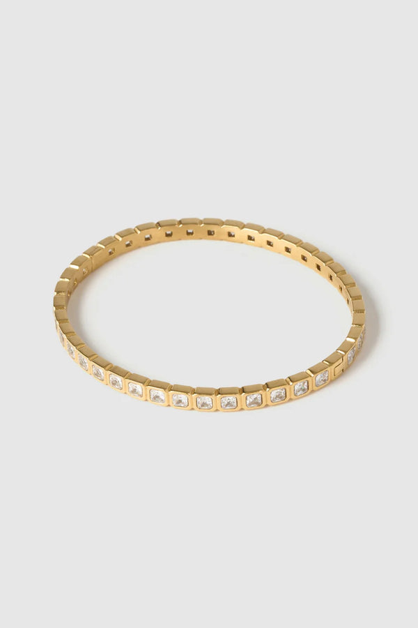 Quinn Gold Cuff Stone by Arms of Eve, a 14k gold PVD open cuff bracelet with radiant zircon stone detailing.