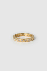 Quinn Gold Ring Stone by Arms of Eve, a 14k gold PVD stacking ring with cubic zirconia detailing.