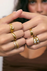 Quinn Gold Ring Stone by Arms of Eve, a 14k gold PVD stacking ring with cubic zirconia detailing.