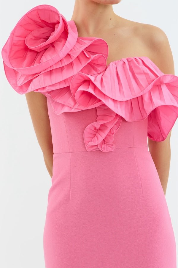 Rosita Gown Shrimp Pink by Rebecca Vallance – A taffeta one-shoulder gown with floral appliqué and back split, perfect for galas, weddings, or black-tie soirées.