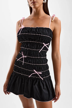 Rani Top White by Bayse – fitted cotton blend top with adjustable wire neckline and ruched detailing for a sculpted silhouette.