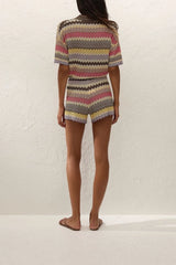 Raya Polo Top Perla Stripe by Faithfull the Brand – a striped knit polo with metallic detail. Perfect for resort styling.