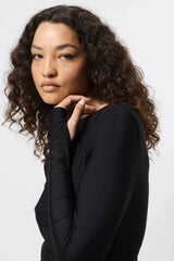 Regal Maxi Dress Black by Mossman - long sleeve jersey maxi dress with draped waist and silver U hardware, perfect for elegant evening events.