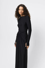 Regal Maxi Dress Black by Mossman - long sleeve jersey maxi dress with draped waist and silver U hardware, perfect for elegant evening events.