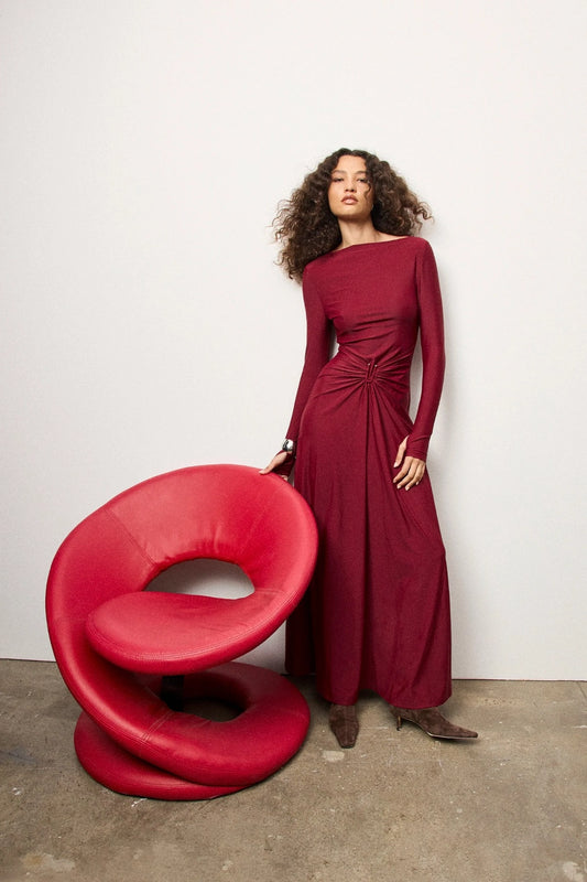 Regal Maxi Dress Bordeaux by Mossman - long sleeve jersey maxi dress with draped waist and silver U hardware, perfect for elegant evening events.