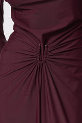 Regal Maxi Dress Bordeaux by Mossman - long sleeve jersey maxi dress with draped waist and silver U hardware, perfect for elegant evening events.