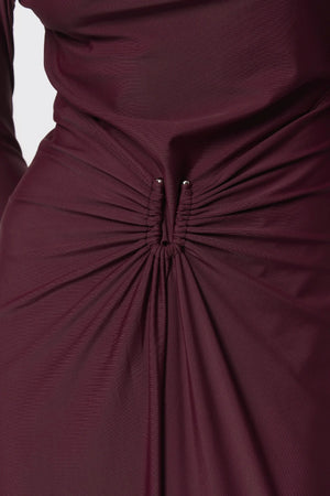 Regal Maxi Dress Bordeaux by Mossman - long sleeve jersey maxi dress with draped waist and silver U hardware, perfect for elegant evening events.