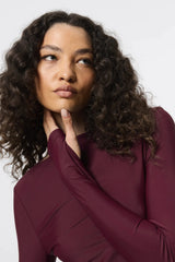 Regal Maxi Dress Bordeaux by Mossman - long sleeve jersey maxi dress with draped waist and silver U hardware, perfect for elegant evening events.