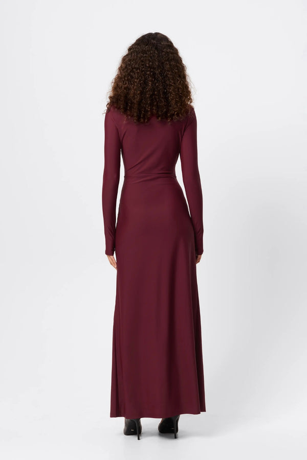 Regal Maxi Dress Bordeaux by Mossman - long sleeve jersey maxi dress with draped waist and silver U hardware, perfect for elegant evening events.