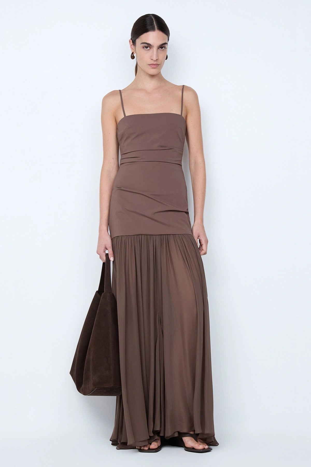 Reid Drop Waist Maxi Dress by Bec and Bridge — a milk chocolate stretch dress with a fitted bodice and sheer godet skirt, perfect for elegant evenings.