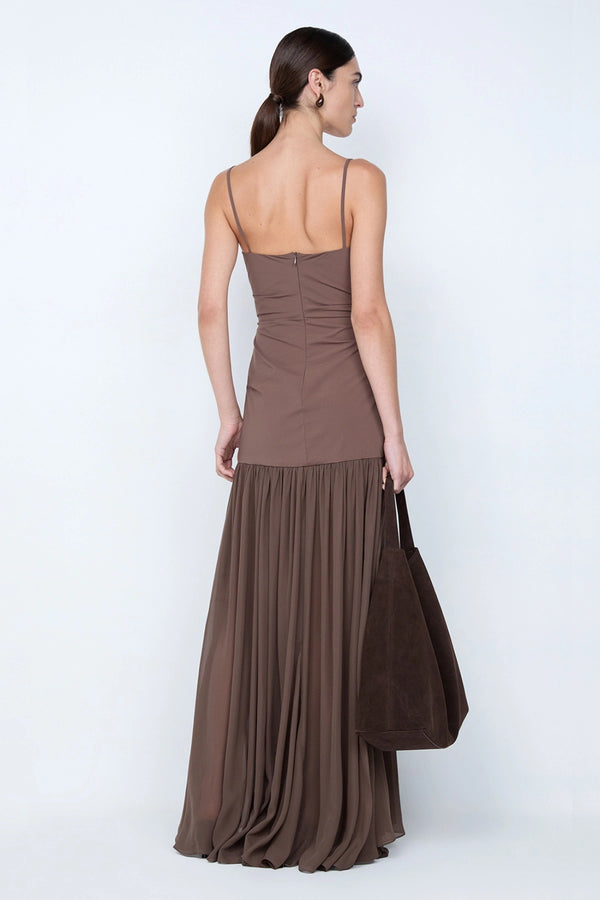 Reid Drop Waist Maxi Dress by Bec and Bridge — a milk chocolate stretch dress with a fitted bodice and sheer godet skirt, perfect for elegant evenings.