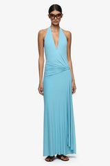 Remi Halter Dress Marine Blue by Bec + Bridge – halter maxi dress with wrap neckline and elegant open back detail.