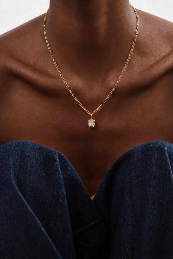 Remy Necklace Blanca by Avant Studio – 18k gold vermeil sterling silver necklace with clear emerald-cut cubic zirconia pendant.