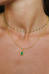 Remy Necklace Emerald by Avant Studio – 18k gold vermeil sterling silver necklace with emerald-cut cubic zirconia pendant.