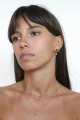 Remy Necklace Emerald by Avant Studio – 18k gold vermeil sterling silver necklace with emerald-cut cubic zirconia pendant.