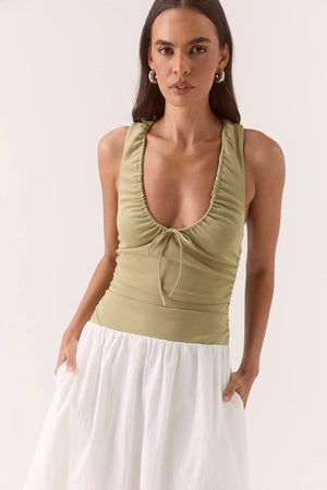 Reve Dress in Soft Khaki/Chalk by Sovere – mixed-fabric midi with drawstring bodice and gathered skirt. Perfect for casual styling.