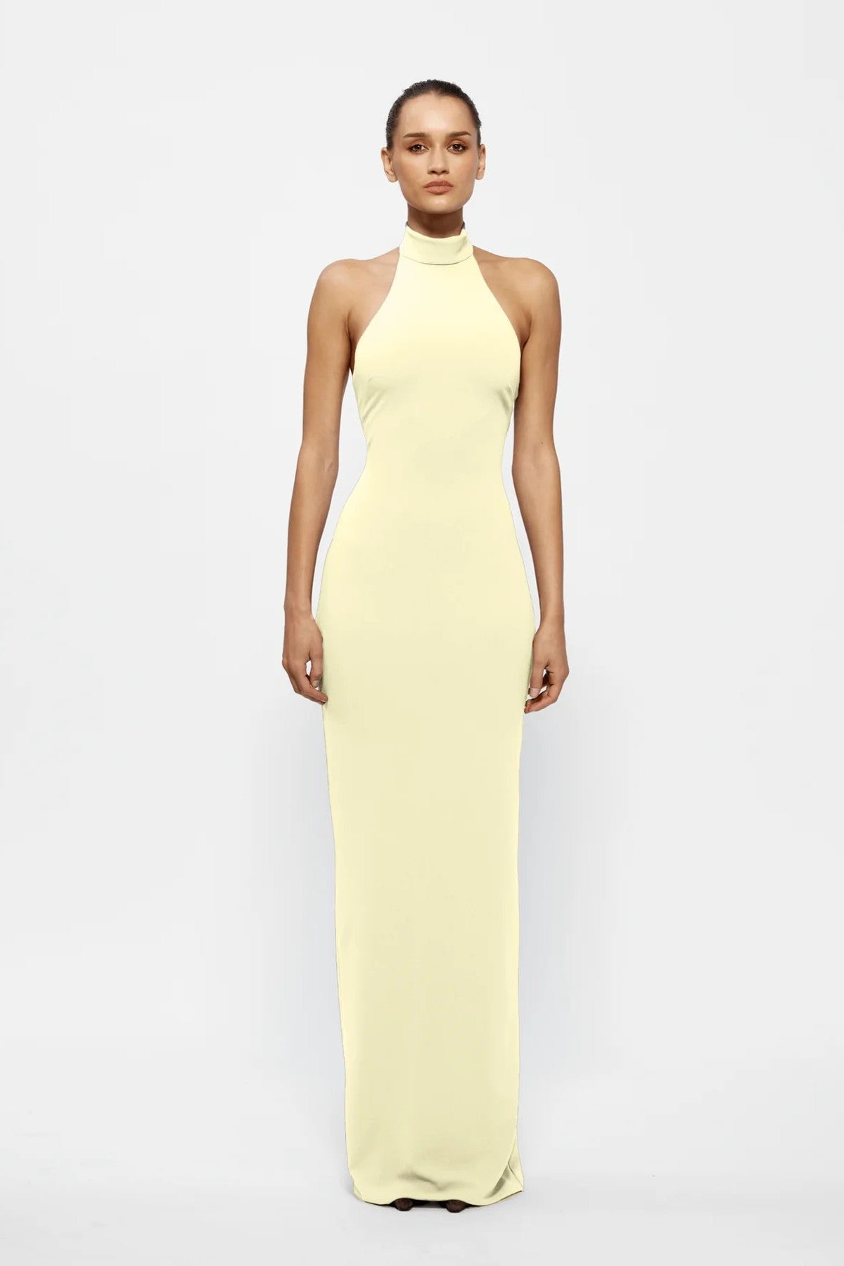 Rhi Gown in Lemon by Effie Kats, a timeless stretch crepe gown featuring a high neckline, open back, and floor-sweeping hem for effortless elegance.