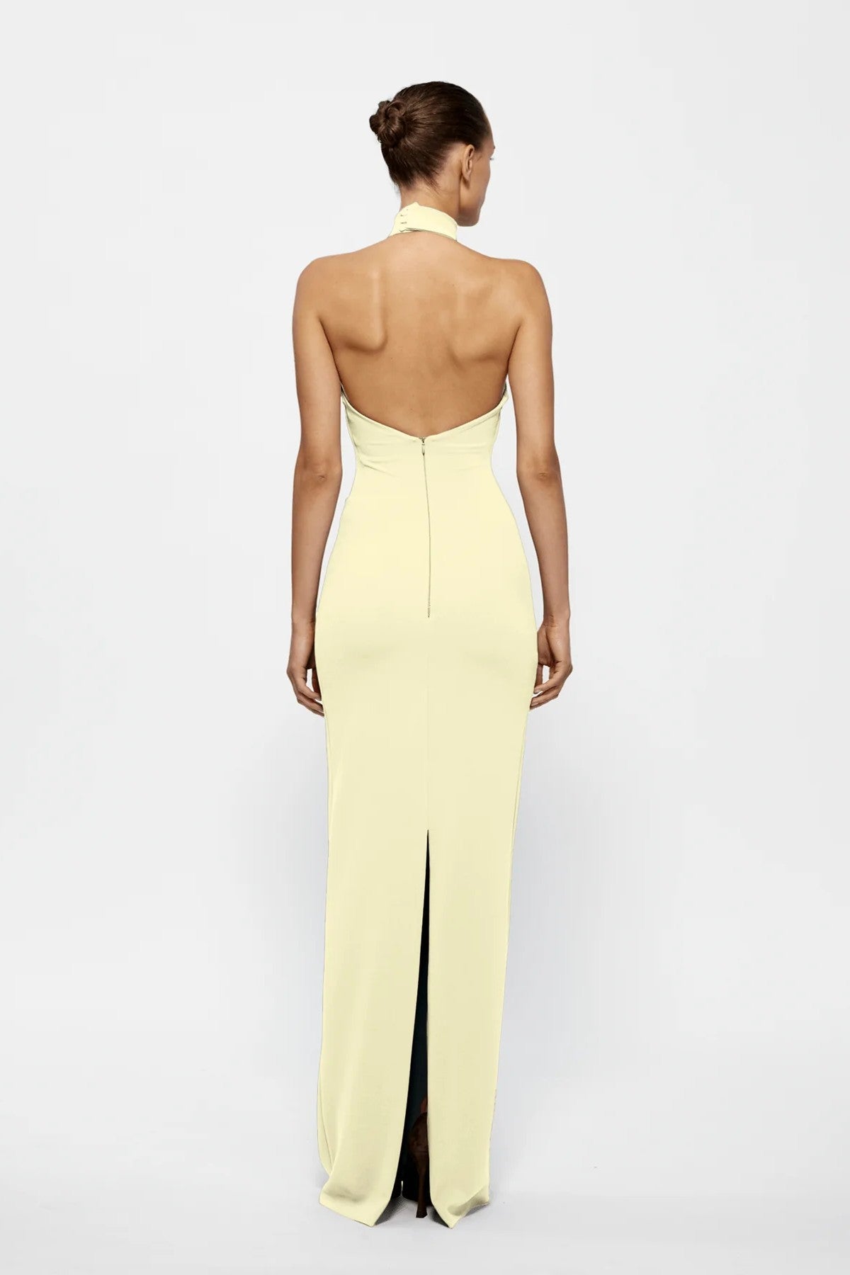 Rhi Gown in Lemon by Effie Kats, a timeless stretch crepe gown featuring a high neckline, open back, and floor-sweeping hem for effortless elegance.