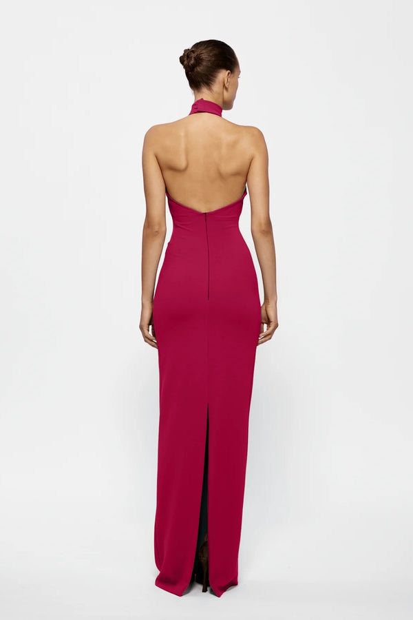 Rhi Gown in Raspberry by Effie Kats, a sleek stretch crepe gown featuring a high neckline, open back, and floor-length hemline for timeless elegance.