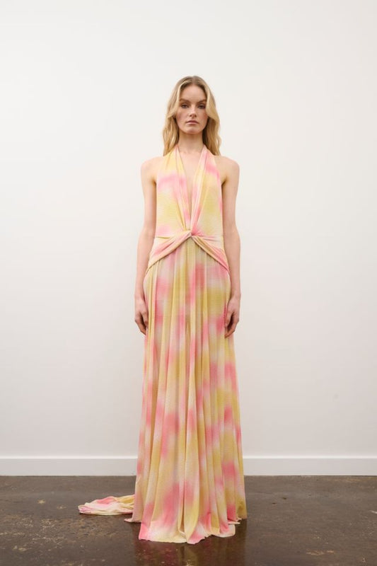 Riana Dress in Yellow Coral Rhinestone by DŽO, a halter maxi dress in abstract print with waist knot detail and subtle rhinestone embellishment.