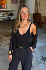 Rita Knit Tank Black by Sneaky Link – a sleek knit tank with soft stretch and body fit. Perfect for layering or matching sets.