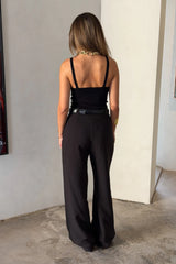Rita Knit Tank Black by Sneaky Link – a sleek knit tank with soft stretch and body fit. Perfect for layering or matching sets.