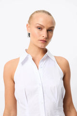 Roam Mini Dress by Mossman, a white cotton racerback shirt dress with collared neckline, button front and tailored mini silhouette.