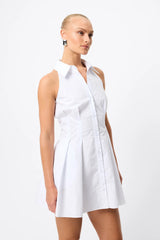 Roam Mini Dress by Mossman, a white cotton racerback shirt dress with collared neckline, button front and tailored mini silhouette.