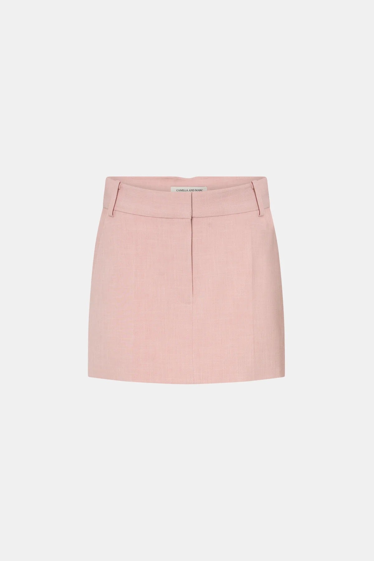 Rode Skirt by Camilla and Marc – a dusty pink tailored mini with a fishtail waistband and resin buckle, perfect for polished day-to-night looks.