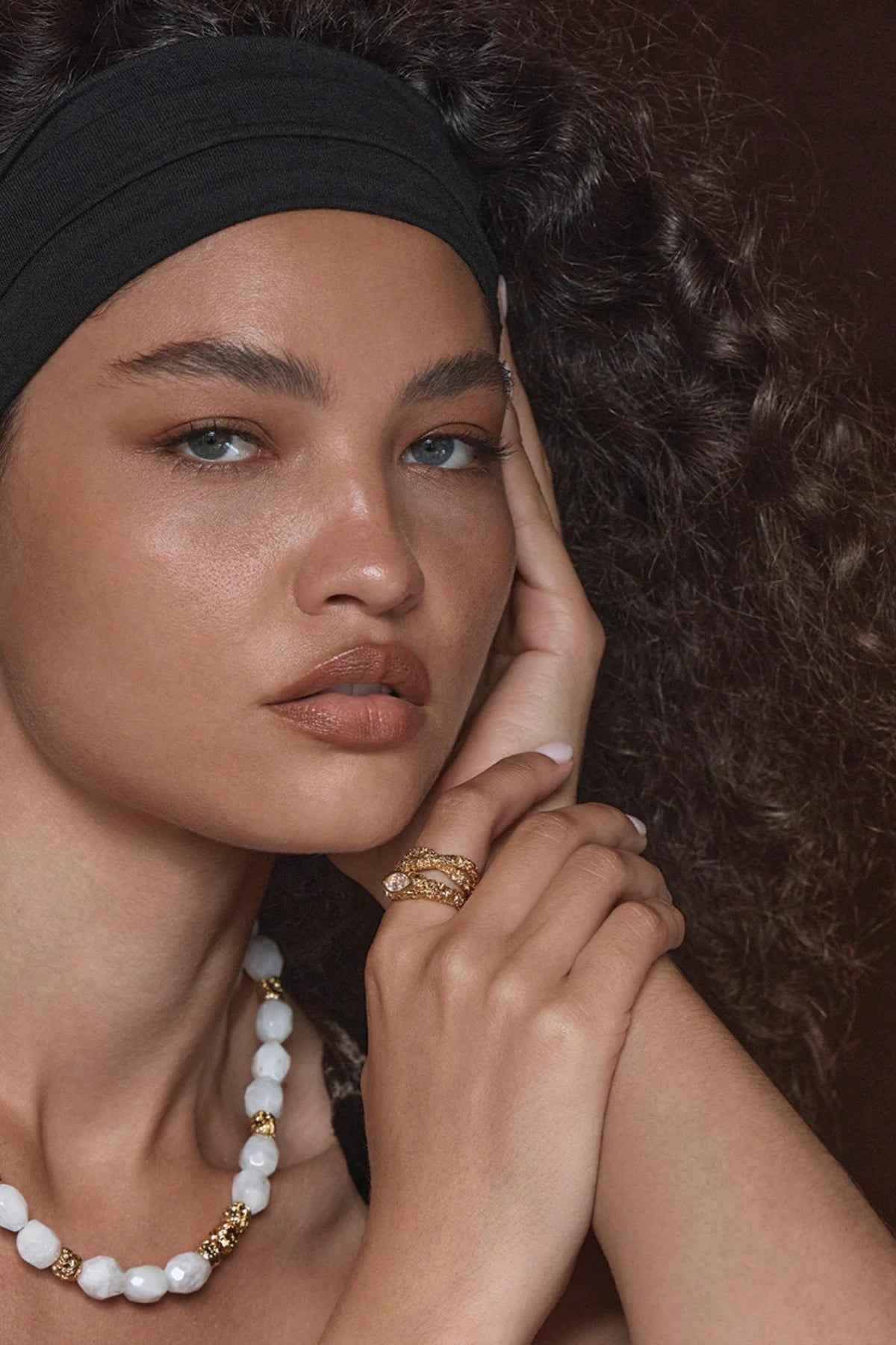 Roma Ring Gold by Amber Sceats, textured gold band with marquise-cut cubic zirconia, a trendy piece perfect for everyday elegance or chic events.