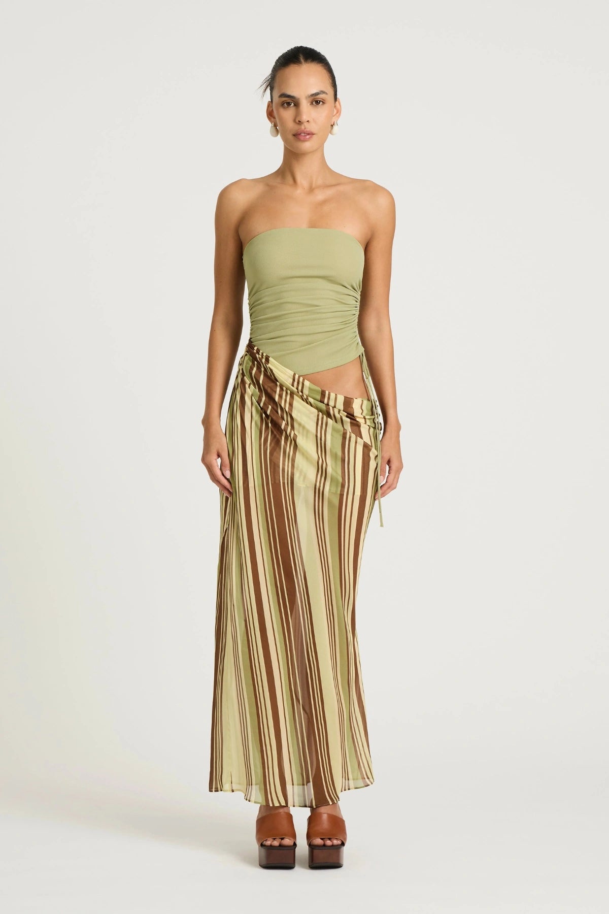 Roscoe Maxi Dress Earth Stripe by Benni, a strapless ruched-bodice maxi with draped chiffon skirt for soft, elegant movement.

