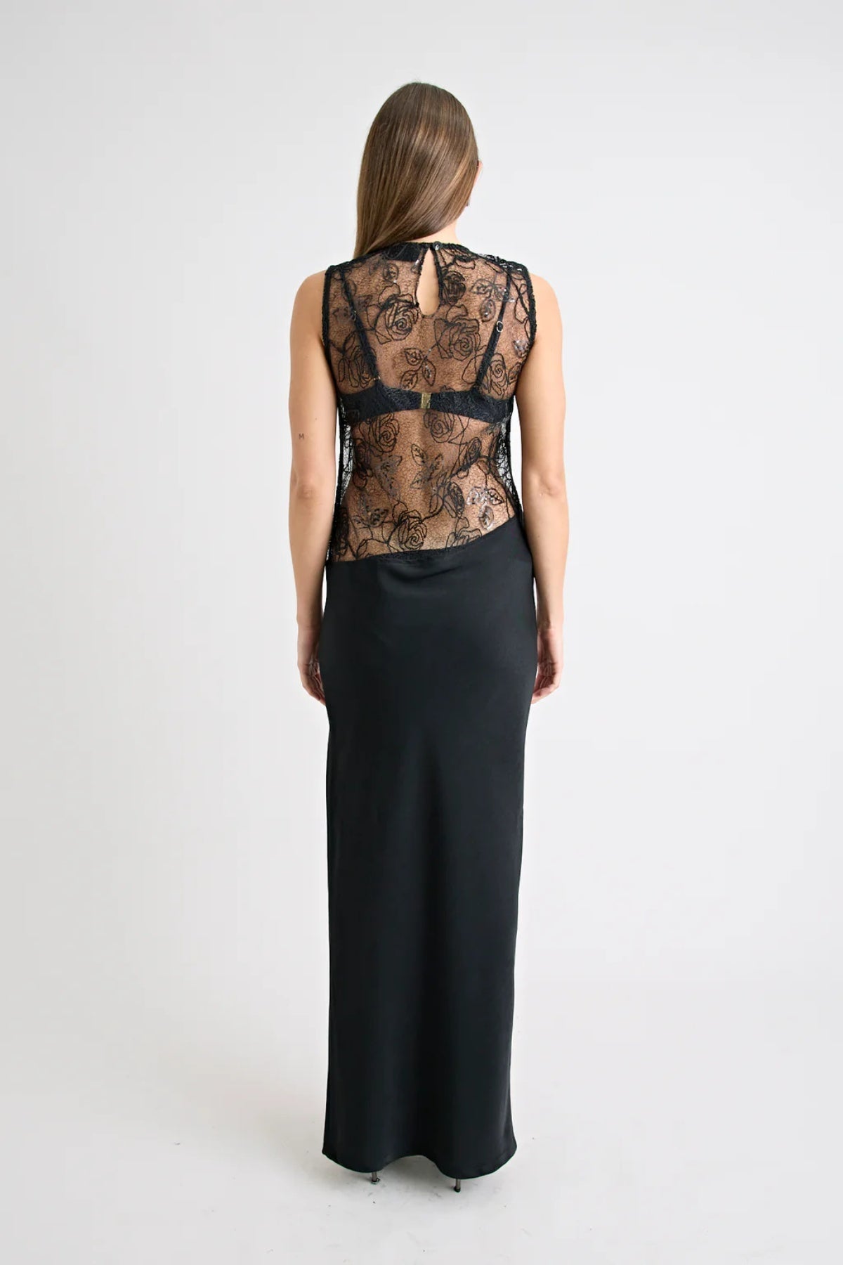 Rozelle Lace Dress in Black by Pfeiffer, sheer lace maxi with a lined skirt and keyhole back. Perfect layered for holidays or nights out.