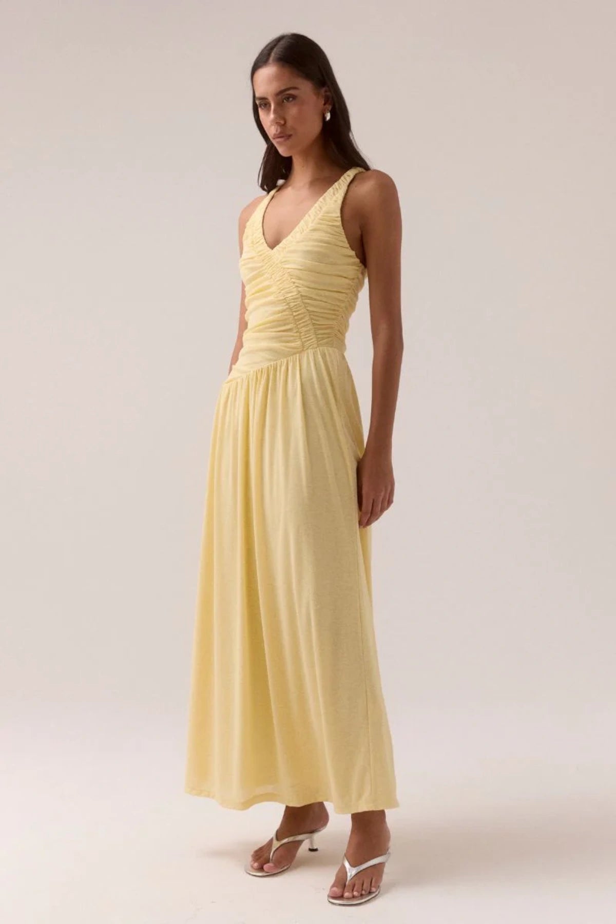 Rua Dress Lemonade by Sovere, trendy mesh maxi with twisted strap details and sculpted fit, a viral pick for statement nights out.