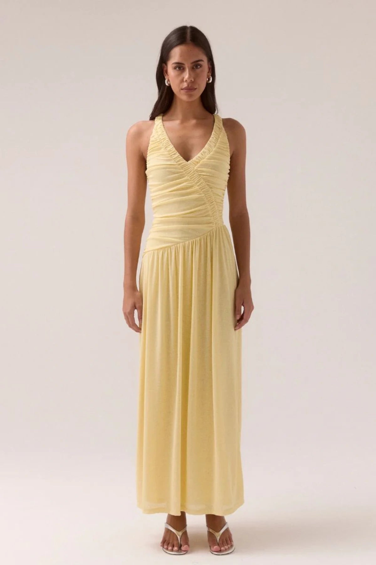 Rua Dress Lemonade by Sovere, trendy mesh maxi with twisted strap details and sculpted fit, a viral pick for statement nights out.
