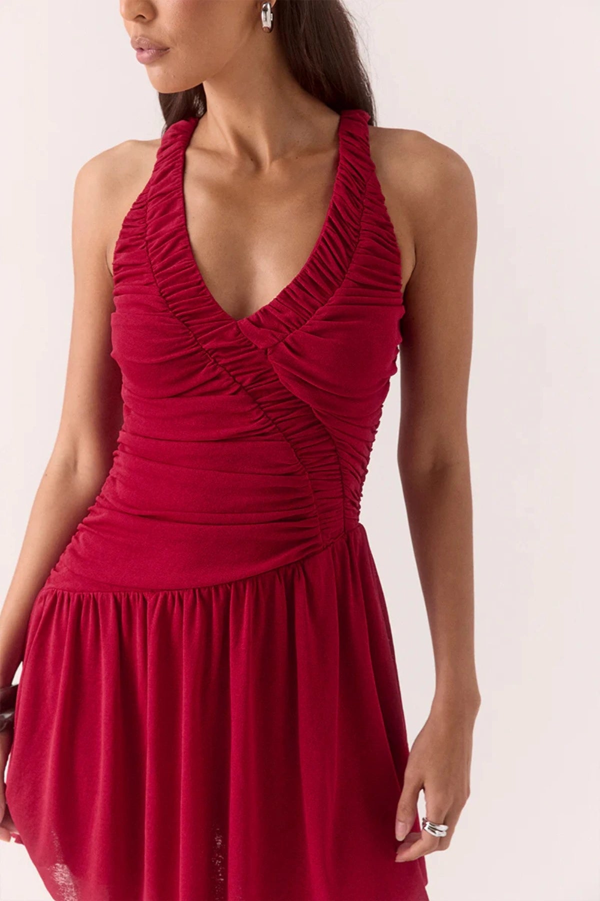 Rua Racer Mini Dress in Raspberry by Sovere, a textured mesh mini with gathered details and asymmetric waist. Perfect for event dressing.